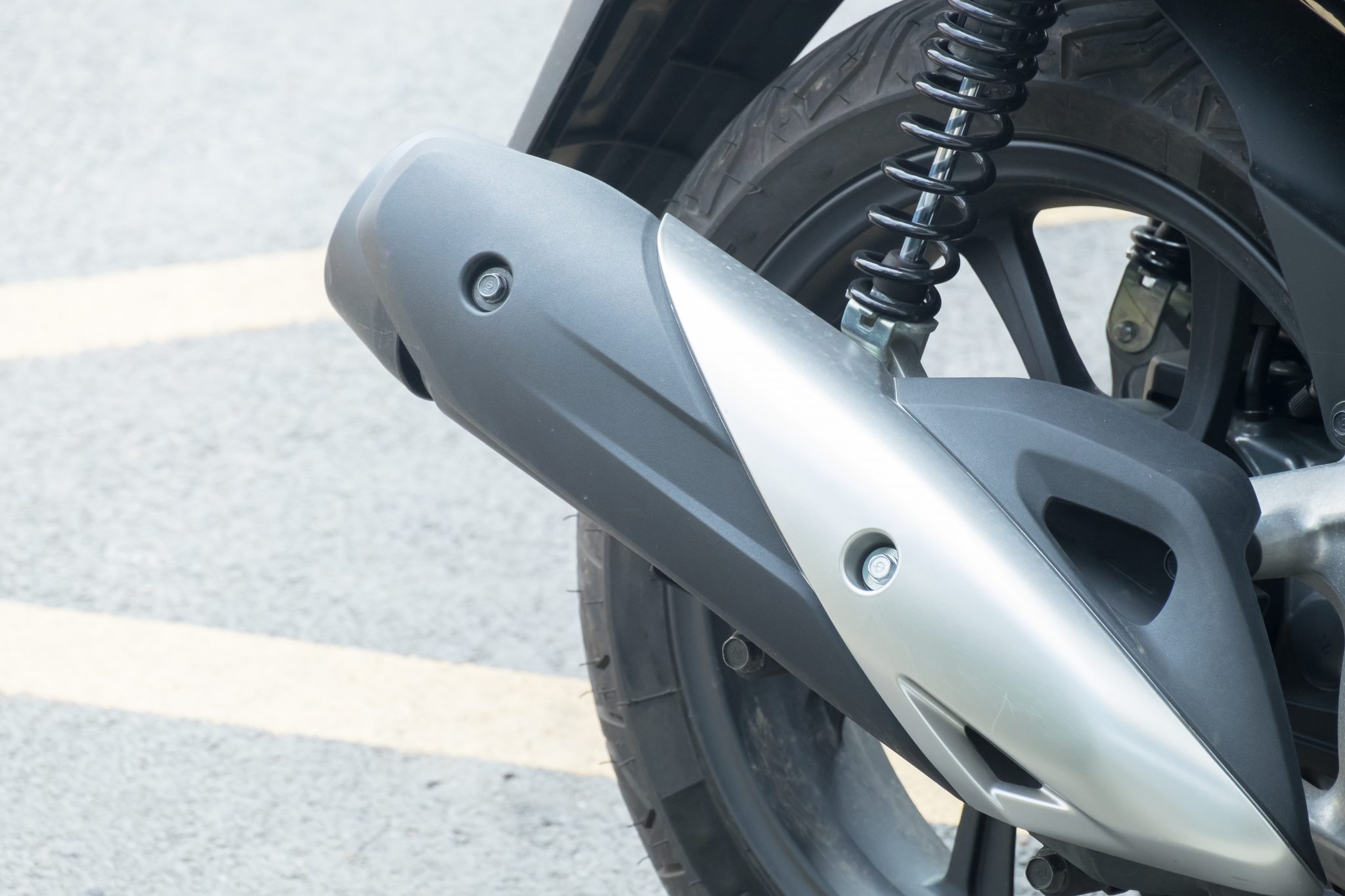 close up exhaust pipe of motorcycle with high temp paint